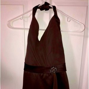 Selling a dress that I wore once for a wedding. So it’s brand new.